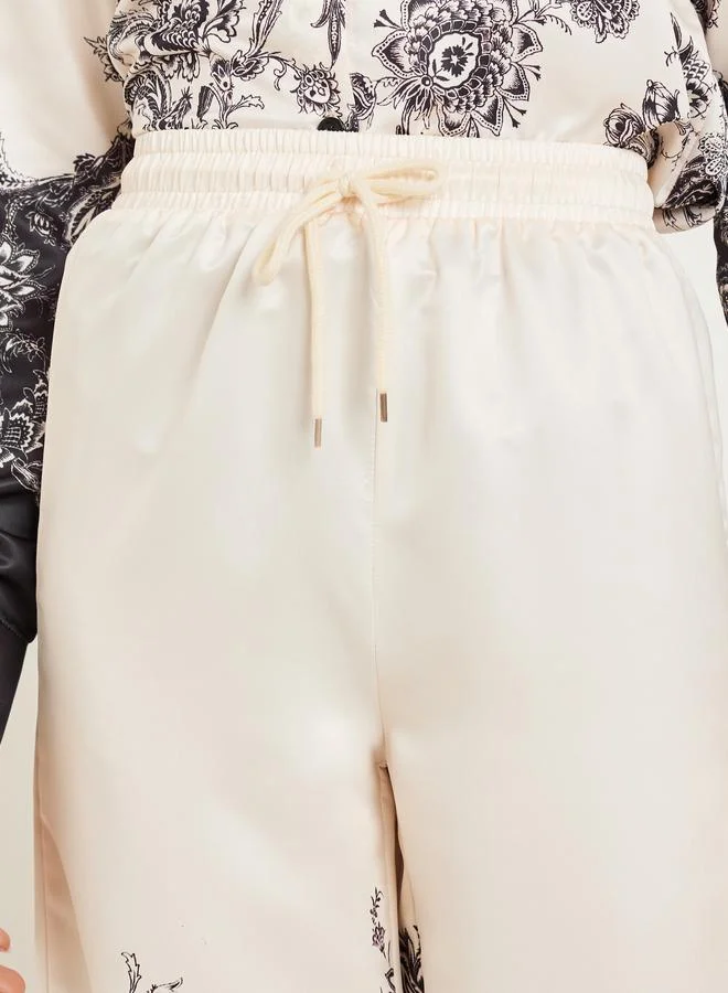 Styli Women Beige Wide Leg Paisley Print Trousers
